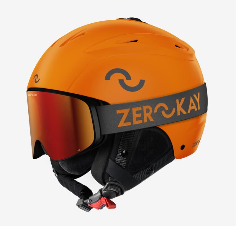 Image featuring the Zerokay TechMatt Ski Helmet in Princeton Orange paired with Contrast Ski Goggles, which have a grey strap with an orange logo and a striking red mirrored lens, epitomizing a bold and dynamic winter sports look.