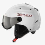 Zerokay luxury ski helmet with integrated visor in white with grey sanitised lining, featuring a gloss finish and offering superior comfort and certified safety features.